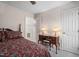 Cozy bedroom featuring a desk and lamps for added comfort at 2221 Dungiven Ct, Garner, NC 27529