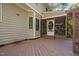 Exterior view of a wooden deck leading to a screened-in porch at 2221 Dungiven Ct, Garner, NC 27529