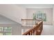 Bright hallway with natural light from a large arched window at 2221 Dungiven Ct, Garner, NC 27529
