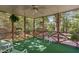 Enclosed porch featuring a ceiling fan and view of backyard at 2221 Dungiven Ct, Garner, NC 27529