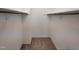 Empty walk-in closet with carpeted flooring and installed racks at 26 Stonewall Way, Durham, NC 27704