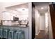 Bright, updated kitchen with white cabinets, granite countertops, and barstool seating at 26 Stonewall Way, Durham, NC 27704