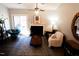 Comfortable living room with natural light, a fireplace, and stylish decor at 26 Stonewall Way, Durham, NC 27704