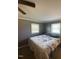 Cozy bedroom featuring a comfortable bed and windows that provide natural light, creating a relaxing atmosphere at 2700 Chub Lake Rd, Roxboro, NC 27574