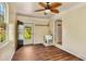 Functional mud room featuring wood floors, natural light, and practical sink creating a versatile space at 2700 Chub Lake Rd, Roxboro, NC 27574