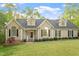 Charming single-Gathering home featuring a well-manicured lawn and a classic architectural design at 2900 Old Trafford Way, Raleigh, NC 27606