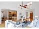 Open living area with a view of the kitchen and hardwood floors at 2900 Old Trafford Way, Raleigh, NC 27606