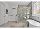 Full bath with a luxurious tub, shower, vanity, and tasteful decor at 30 Mist Wood Ct, Pittsboro, NC 27312