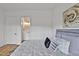 Stylish bedroom with a comfortable bed and an ensuite bathroom at 30 Mist Wood Ct, Pittsboro, NC 27312