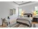 Inviting bedroom features neutral decor and great natural light from the window at 30 Mist Wood Ct, Pittsboro, NC 27312