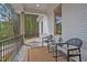 Inviting front porch featuring comfortable seating, perfect for relaxing and enjoying the peaceful surroundings at 30 Mist Wood Ct, Pittsboro, NC 27312