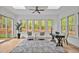 Bright and airy home office space with a ceiling fan and a lovely view at 30 Mist Wood Ct, Pittsboro, NC 27312