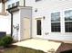 Cozy backyard with a door to the house, patio, and green space at 3007 Cypress Lagoon Ct, Durham, NC 27703