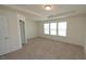 Bedroom with carpet and natural lighting at 3007 Cypress Lagoon Ct, Durham, NC 27703