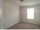 Bright bedroom featuring a window and neutral carpet for a versatile space at 3007 Cypress Lagoon Ct, Durham, NC 27703