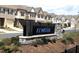 The 'Atwater' neighborhood sign boasts stone accents and manicured landscaping at 3007 Cypress Lagoon Ct, Durham, NC 27703