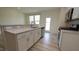 Well-lit kitchen with stainless steel appliances, granite countertops, and a sink at 3007 Cypress Lagoon Ct, Durham, NC 27703