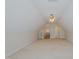 Large carpeted bonus room featuring neutral walls and a ceiling fan at 308 Grove Hall Ln, Mebane, NC 27302