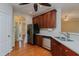 Spacious kitchen with stainless steel appliances, and wood floors at 308 Grove Hall Ln, Mebane, NC 27302