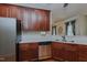 Gourmet kitchen with ample cabinet space, modern appliances, and a open plan at 308 Grove Hall Ln, Mebane, NC 27302