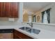 Beautiful Kitchen with stainless steel sink, and view of the living area at 308 Grove Hall Ln, Mebane, NC 27302