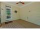 Screened porch with ceiling fan and decorative star at 308 Grove Hall Ln, Mebane, NC 27302