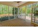 Spacious screened-in porch offering serene views of the backyard at 308 Grove Hall Ln, Mebane, NC 27302