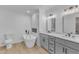 Elegant bathroom featuring a soaking tub, tiled shower, and double vanity with modern fixtures at 3100 Greenville Loop Rd, Wake Forest, NC 27587