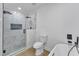 Bathroom featuring glass enclosed shower, soaking tub, and tile accents at 3100 Greenville Loop Rd, Wake Forest, NC 27587