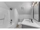 Bathroom features modern fixtures, a tub with shower, and a stone vanity at 3100 Greenville Loop Rd, Wake Forest, NC 27587