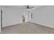 Bright bedroom with neutral carpet, ceiling fan and bathroom access at 3100 Greenville Loop Rd, Wake Forest, NC 27587