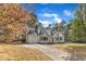 Charming two-story home with a landscaped yard and an inviting entryway at 3100 Greenville Loop Rd, Wake Forest, NC 27587