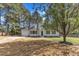 Charming two-story home with a landscaped yard and inviting curb appeal at 3100 Greenville Loop Rd, Wake Forest, NC 27587