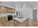 Updated kitchen with a large island, stainless steel appliances, and plenty of cabinet storage at 3100 Greenville Loop Rd, Wake Forest, NC 27587