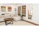 Bright living room featuring a large sectional sofa, area rug, hardwood floors, and natural light at 3125 Morningside Dr, Raleigh, NC 27607