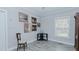 Neutral bedroom featuring light gray walls, wood-look floors and detailed trim work at 322 W Hill N Ave, Hillsborough, NC 27278