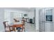 Cozy living area featuring a fireplace and modern stainless steel appliances at 322 W Hill N Ave, Hillsborough, NC 27278