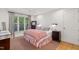 Relaxing bedroom with a ceiling fan, stylish curtains, and neutral tones at 32430 Archdale, Chapel Hill, NC 27517