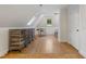 Spacious bonus room with hardwood floors and plenty of natural light for a variety of uses at 32430 Archdale, Chapel Hill, NC 27517