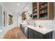 Modern kitchenette with stainless steel appliances, custom cabinets, and a bright, airy atmosphere at 32430 Archdale, Chapel Hill, NC 27517