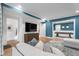 Comfortable living room with stylish decor and a view into the adjacent bonus room with a pool table at 32430 Archdale, Chapel Hill, NC 27517