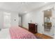 Bright main bedroom featuring hardwood floors and an ensuite bathroom for added privacy and convenience at 32430 Archdale, Chapel Hill, NC 27517
