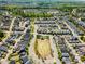 Wide aerial view of the residential area, highlighting the lush greenery and neatly arranged homes at 379 Tobacco Farm Way, Chapel Hill, NC 27516