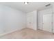 Simple and neutral bedroom offering an empty canvas for personalization, complete with a closet and a door to the hallway at 379 Tobacco Farm Way, Chapel Hill, NC 27516