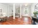 Inviting foyer with hardwood floors, columns, and a view into the living areas at 379 Tobacco Farm Way, Chapel Hill, NC 27516