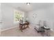 Bright office space with a window view, desk area, and comfortable seating, perfect for a home workspace at 379 Tobacco Farm Way, Chapel Hill, NC 27516