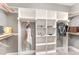 Organized walk-in closet with custom shelving, hanging rods, and ample space for storing clothing and accessories at 379 Tobacco Farm Way, Chapel Hill, NC 27516