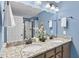 Stylish bathroom with dual sinks, granite countertops, and modern fixtures at 4228 Nc 42 Hwy, Raleigh, NC 27603