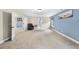 Carpeted bonus bedroom featuring two-tone walls, natural light, and an open doorway at 4228 Nc 42 Hwy, Raleigh, NC 27603