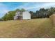 Charming two-story home with vinyl siding and a spacious yard backing up to mature trees at 4228 Nc 42 Hwy, Raleigh, NC 27603